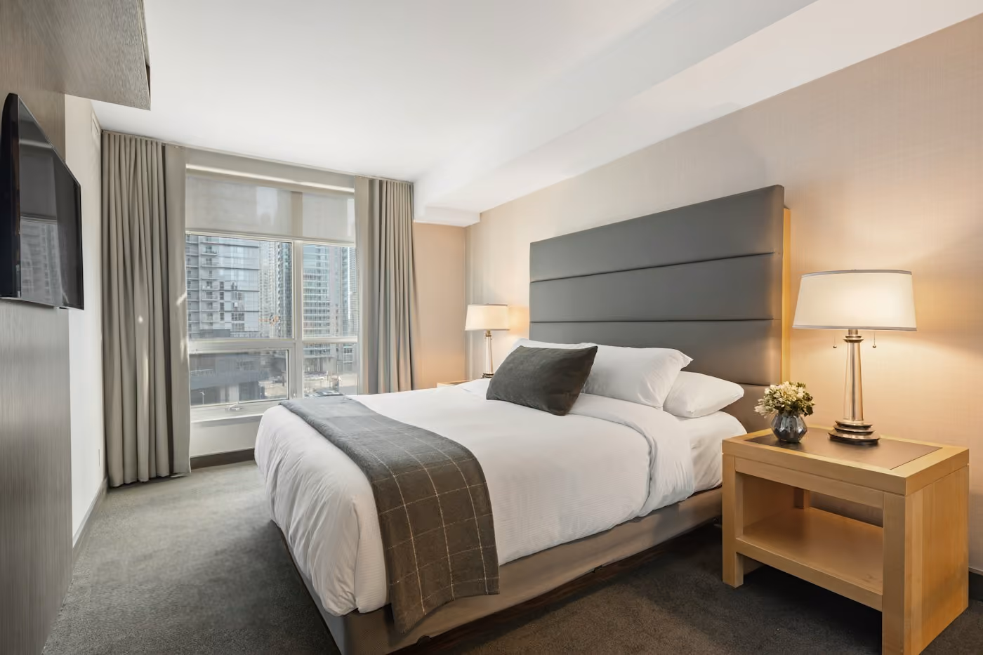 Illustrative sample photo: Furnished bedroom. Source: Unsplash (photo-1631049307264-da0ec9d70304).