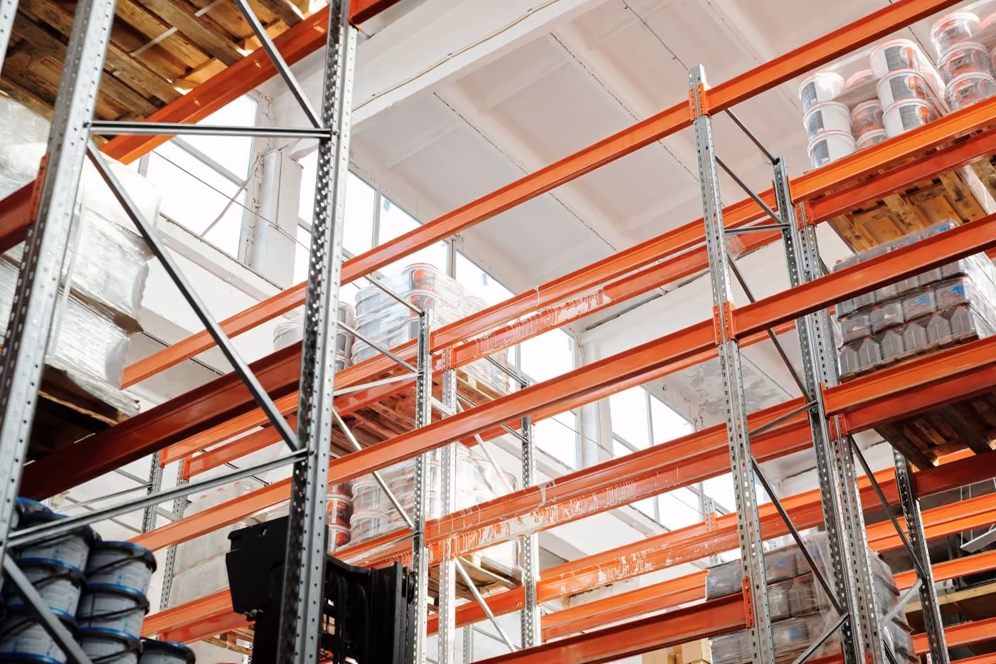 Illustrative sample photo: Warehouse storage racks. Source: Pexels (4487364).
